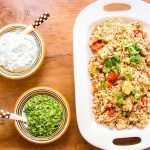 Paneer biryani sautéed with tomatoes, served with cucumber raita and mint chutney. One dish vegetarian meal.