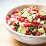 Refreshing watermelon salsa with peaches, cucumbers, cilantro, and lime for easy entertaining.