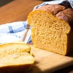 Tender loaf of bread that includes a mashed sweet potato, and sweetened with a little honey.