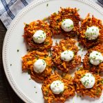 Appetizer or Entree: Sweet potato latkes with jalapeño, scallions and Ancho chili powder, topped with lime sour cream and chives.