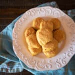 A stack of sweet potato biscuits on a plate.