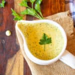 A small pitcher of sauce gribiche, made with hard-boiled eggs.