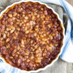 Vegan baked beans in a baking dish.
