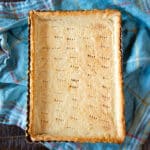 A baked pie crust in a tart pan.