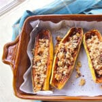 Delicata squash boats roasted and stuffed with a fruity quinoa stuffing.