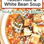 A bowl of Tuscan kale and white bean soup topped with croutons.