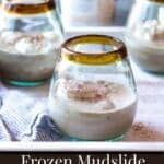 Glasses filled with frozen mudslides on a tray with text overlay.